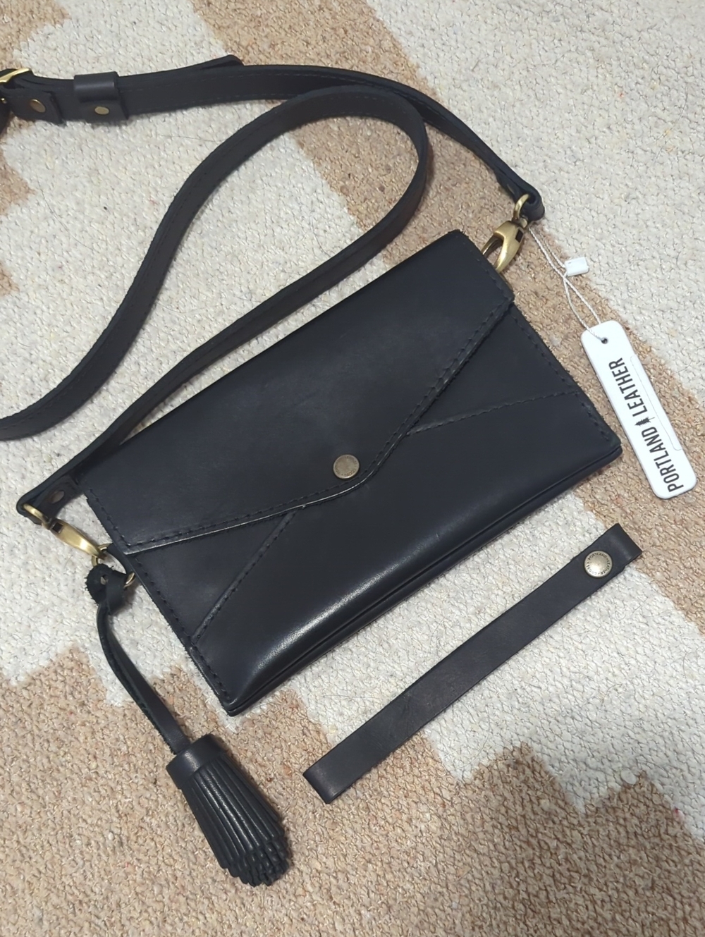 Portland Leather Black Envelope Crossbody with Tassel + Wrist Strap
